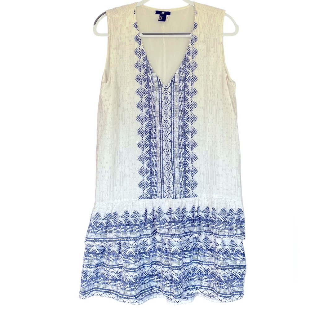 H and M cotton dress with blue design and ruffle hem. Size 10 V neck
